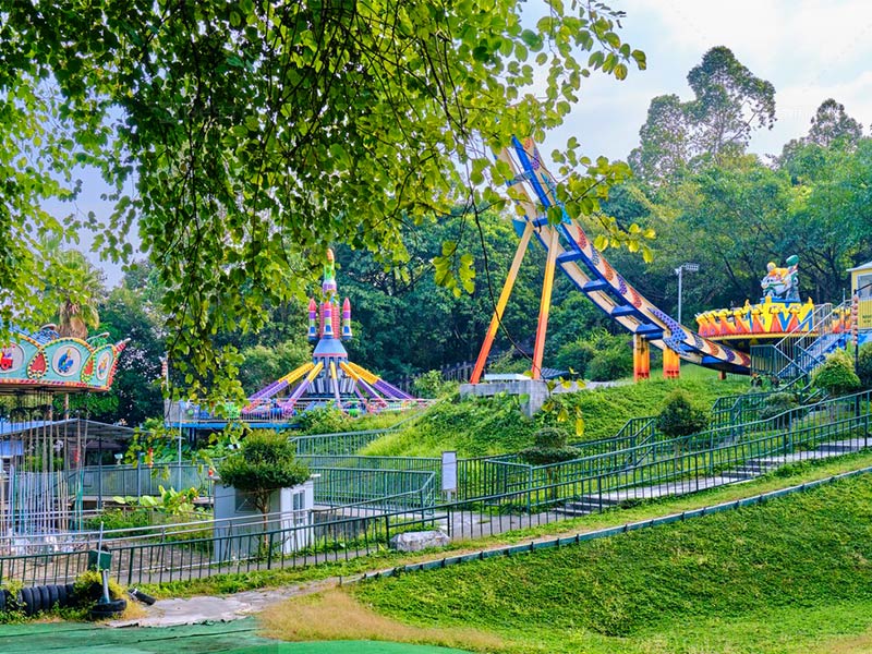Disco carnival amusement rides in urban parks